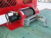 Hydraulic winch to load sea cans