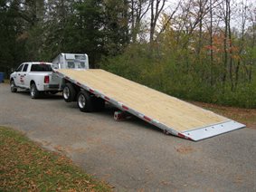 Sliding axle trailer